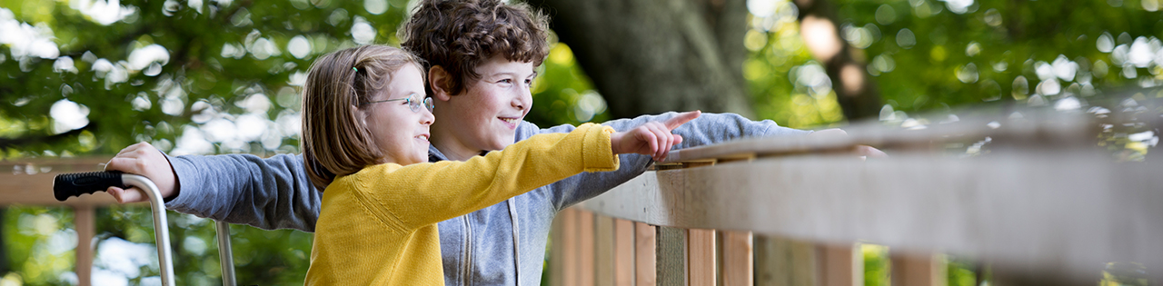 Children in wheelchair laughing