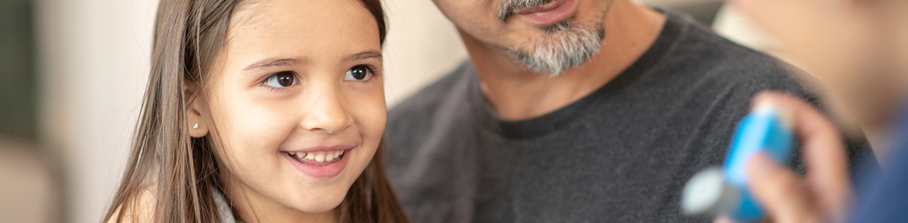 Dad and daughter laughing