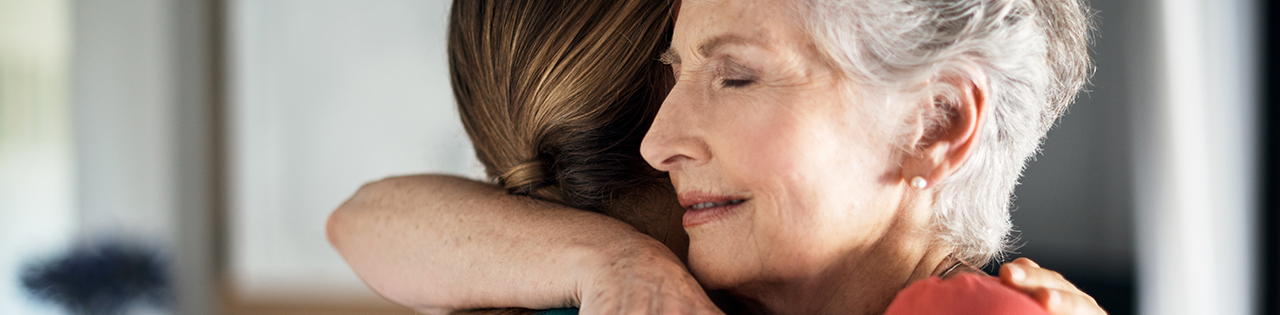 Victims of rogue breast surgeon Ian Paterson hugging each other