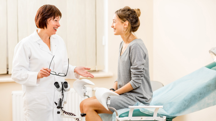 Gynaecologist talking to patient at a hospital
