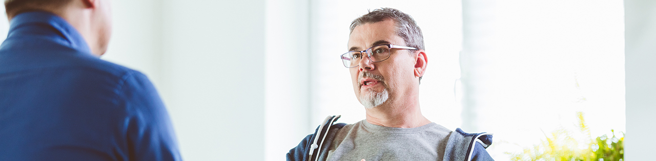 Psychiatrist talking to patient