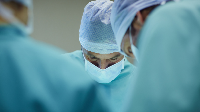 Surgeons performing surgery