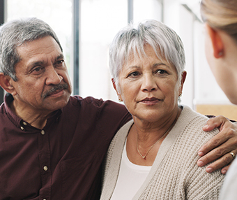 Husband wife being told about husband's brain tumour